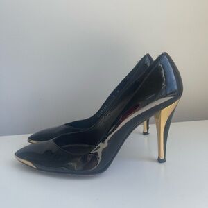 Stuart Weitzman Black Patent Leather Pointed-Toe Pumps with Gold Heels